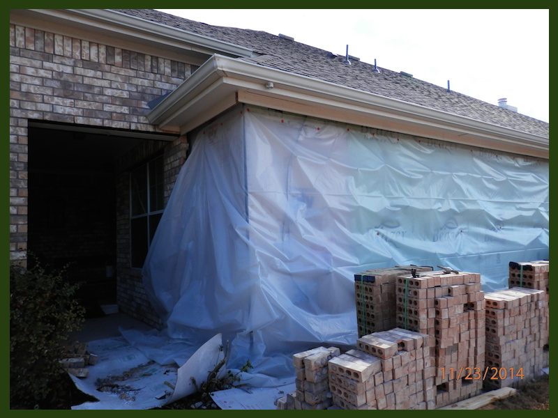 Exterior brick and stone wall remodel